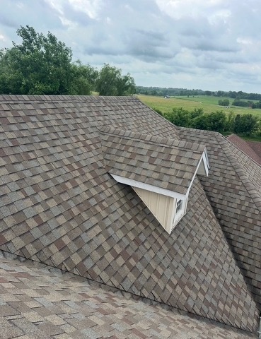 View from a shingle roof over a Branson neighborhood during an inspection